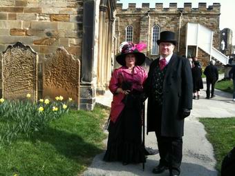 Photo of Whitby Gothic couple outside St. Mary's Church