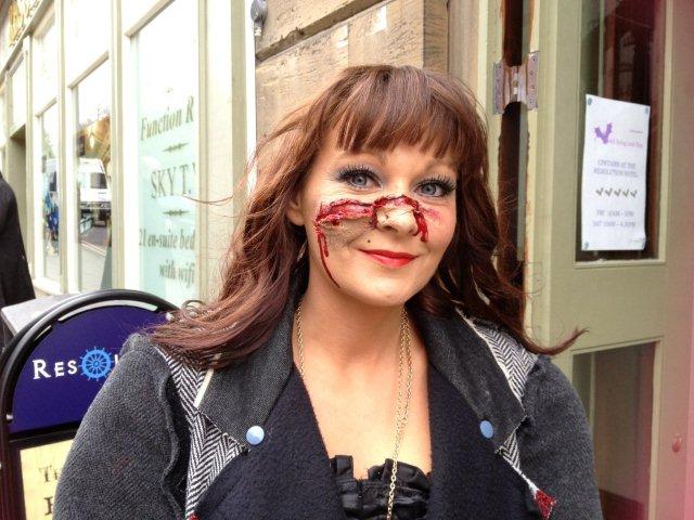 Photo of Gothic lady with a scar on her nose