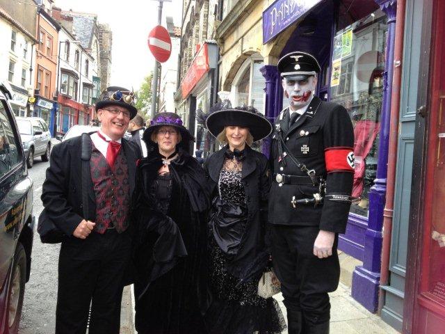 Photo of two Gothic Couples one dressed as a Nazi