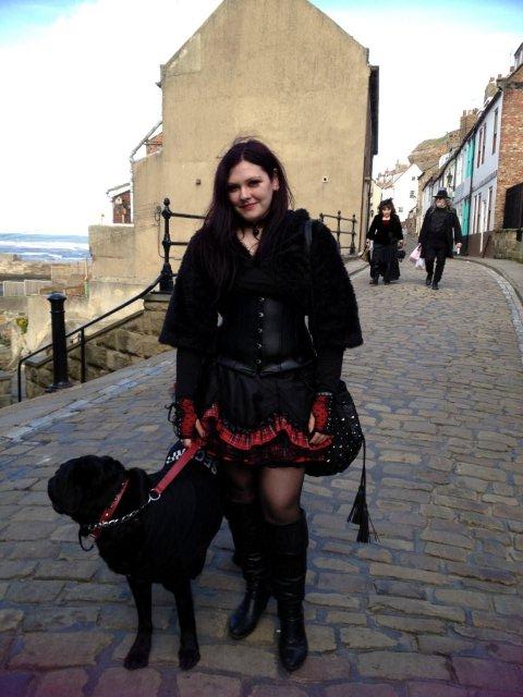 Photo of a Gothic lady and dog