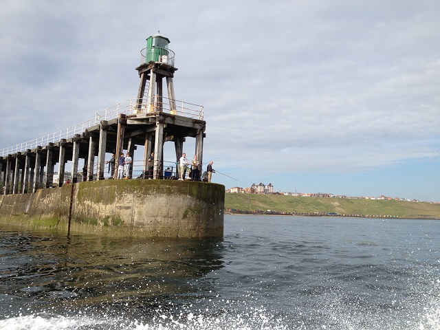 Photo of anglers on Whitby West Pier extension