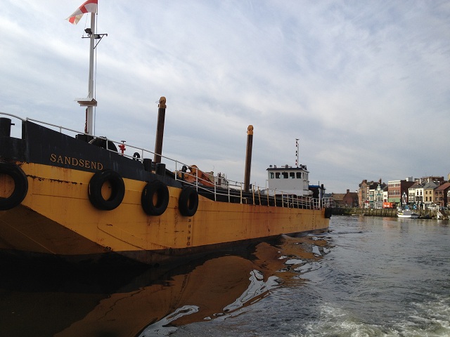 A photo of the dredger in Whitby  Habour